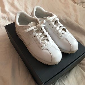 all white leather Nike Cortez